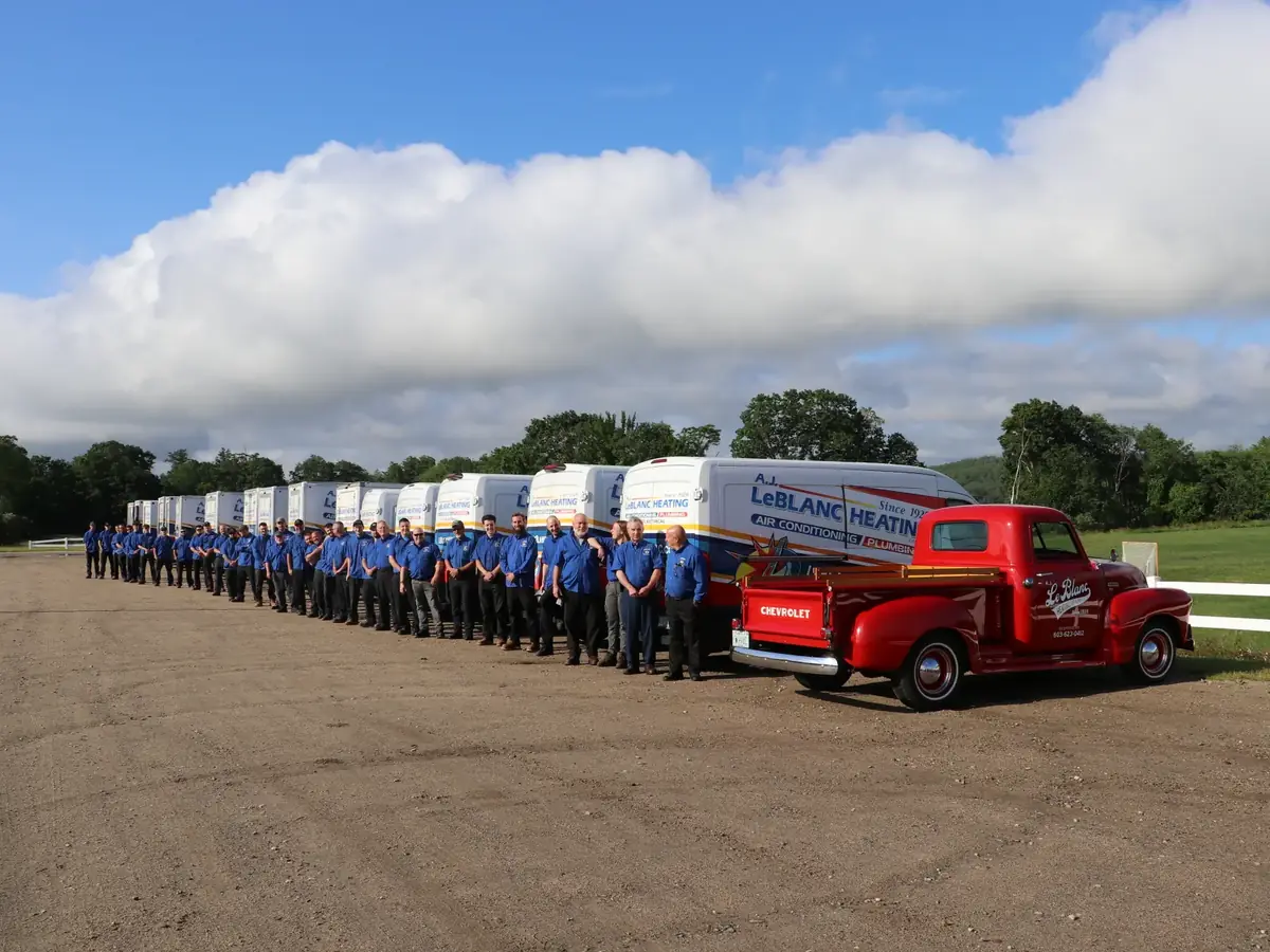 A.J. LeBlanc Heating service fleet and team serving Atkinson, NH