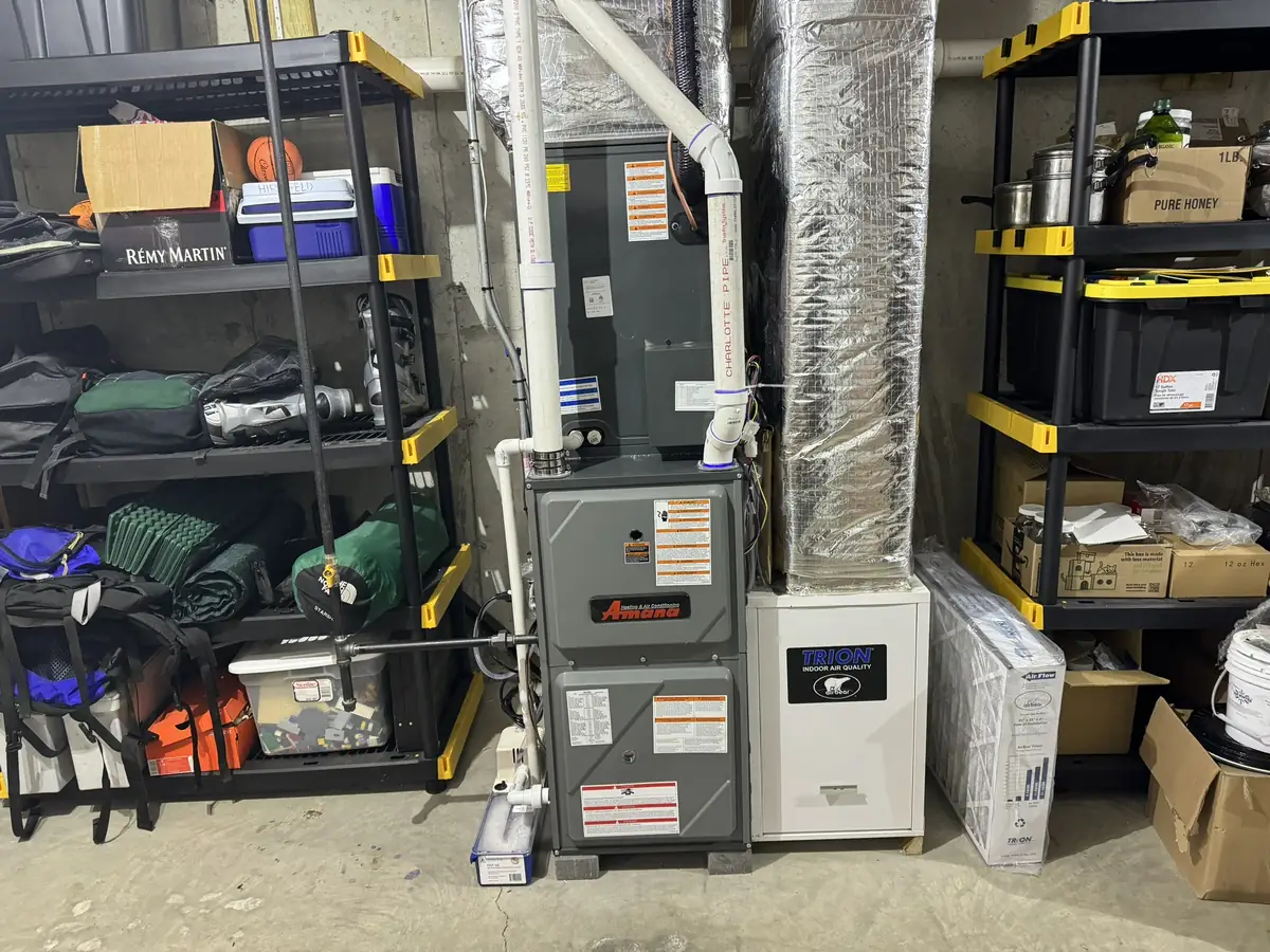 Amana gas furnace installation with indoor air quality equipment by A.J. LeBlanc Heating in a Southern NH basement