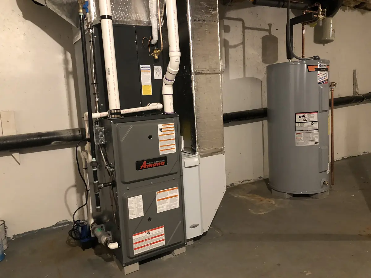 Amana high-efficiency gas furnace installation in Southern NH basement