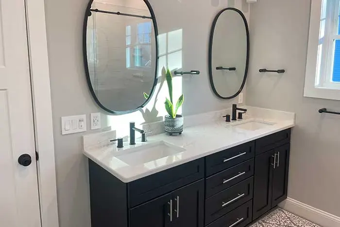 Bathroom double vanity installed by A.J. LeBlanc Heating in a Southern NH home