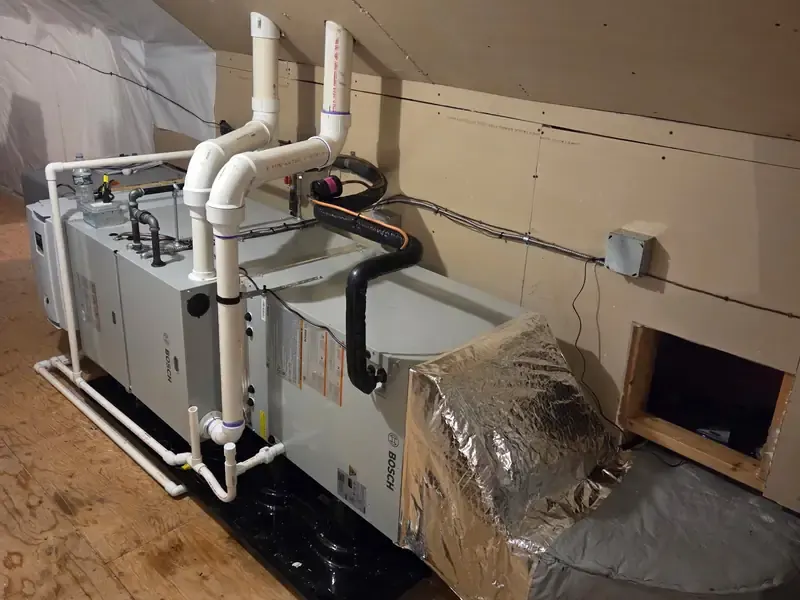 Bosch 96% AFUE condensing horizontal gas furnace installation in a Southern NH attic crawl space