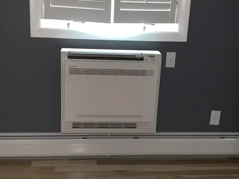 Daikin floor-mounted ductless mini split indoor unit in a Southern NH home