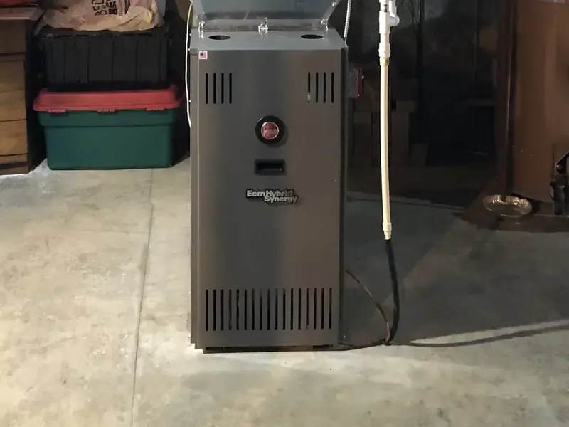 Rheem ECM oil furnace installation in a Southern NH basement