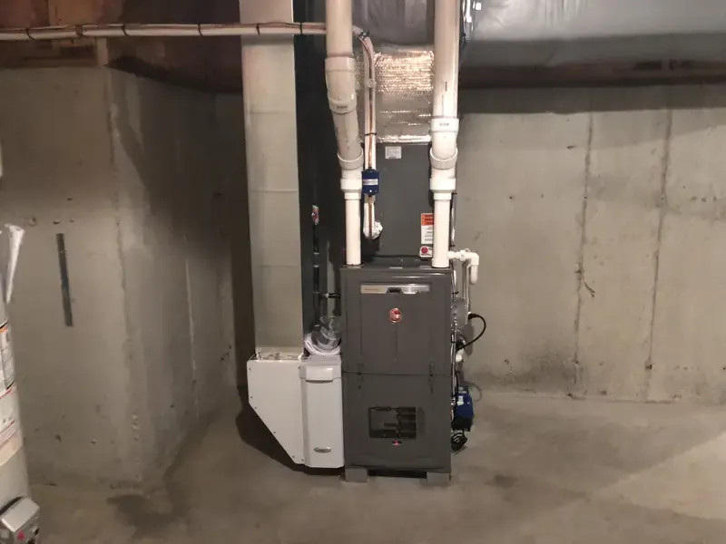 Rheem 96% AFUE condensing gas furnace with Aprilaire accessory in Southern NH